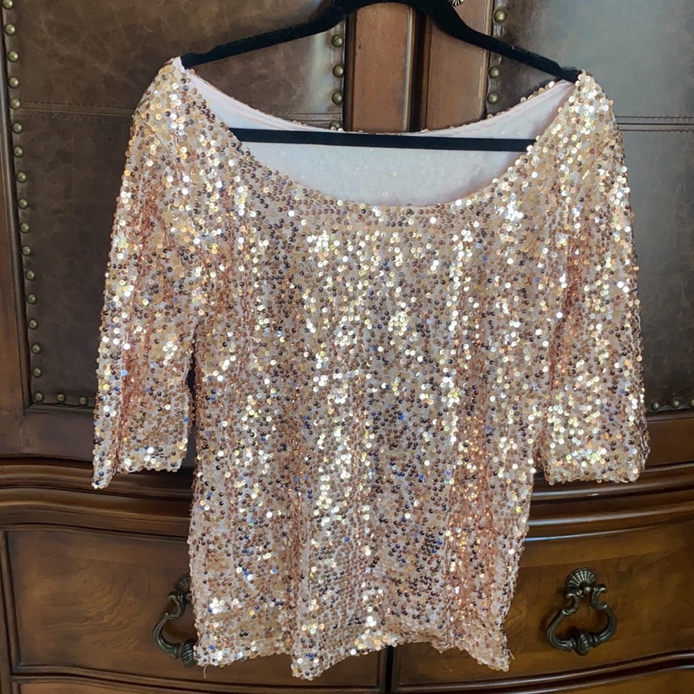 Light pink off the shoulder sequince top